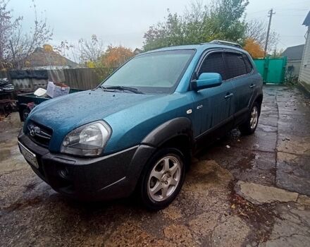 Синий Хендай Туксон, объемом двигателя 2 л и пробегом 210 тыс. км за 7550 $, фото 1 на Automoto.ua