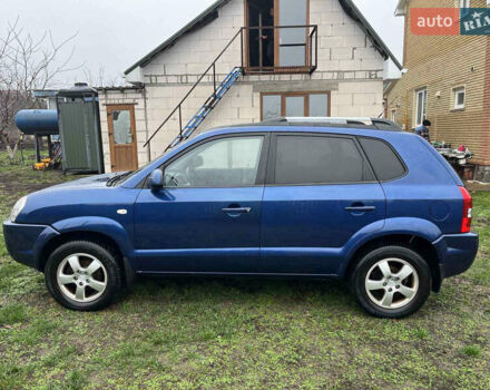 Синій Хендай Туксон, об'ємом двигуна 1.98 л та пробігом 135 тис. км за 7450 $, фото 3 на Automoto.ua