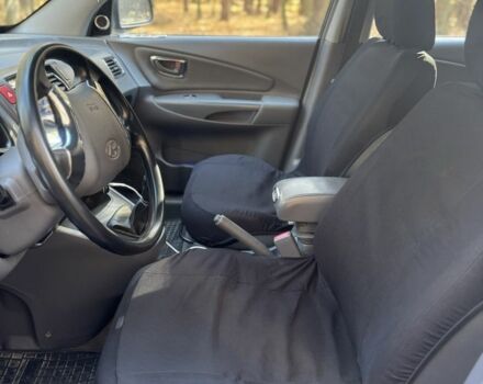 Синій Хендай Туксон, об'ємом двигуна 2 л та пробігом 272 тис. км за 3100 $, фото 6 на Automoto.ua