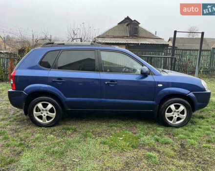 Синій Хендай Туксон, об'ємом двигуна 1.98 л та пробігом 135 тис. км за 7450 $, фото 4 на Automoto.ua