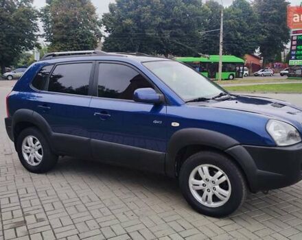 Синій Хендай Туксон, об'ємом двигуна 2 л та пробігом 225 тис. км за 7950 $, фото 2 на Automoto.ua