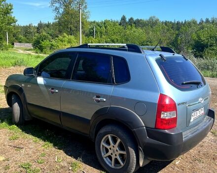 Синий Хендай Туксон, объемом двигателя 2 л и пробегом 280 тыс. км за 7500 $, фото 1 на Automoto.ua
