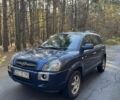 Синий Хендай Туксон, объемом двигателя 2 л и пробегом 291 тыс. км за 3400 $, фото 1 на Automoto.ua