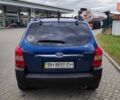 Синій Хендай Туксон, об'ємом двигуна 2 л та пробігом 225 тис. км за 7950 $, фото 5 на Automoto.ua