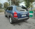 Синий Хендай Туксон, объемом двигателя 2 л и пробегом 280 тыс. км за 6500 $, фото 4 на Automoto.ua