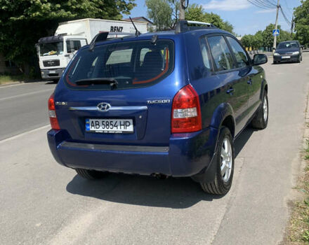 Синий Хендай Туксон, объемом двигателя 1.98 л и пробегом 210 тыс. км за 7300 $, фото 8 на Automoto.ua
