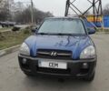 Синий Хендай Туксон, объемом двигателя 2 л и пробегом 225 тыс. км за 7300 $, фото 1 на Automoto.ua