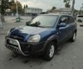 Синий Хендай Туксон, объемом двигателя 2 л и пробегом 280 тыс. км за 6500 $, фото 1 на Automoto.ua