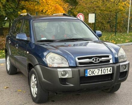 Синий Хендай Туксон, объемом двигателя 2 л и пробегом 262 тыс. км за 4450 $, фото 2 на Automoto.ua