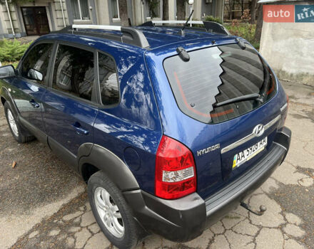 Синий Хендай Туксон, объемом двигателя 2 л и пробегом 190 тыс. км за 7500 $, фото 6 на Automoto.ua