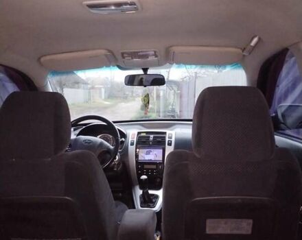 Синій Хендай Туксон, об'ємом двигуна 1.98 л та пробігом 217 тис. км за 8000 $, фото 14 на Automoto.ua