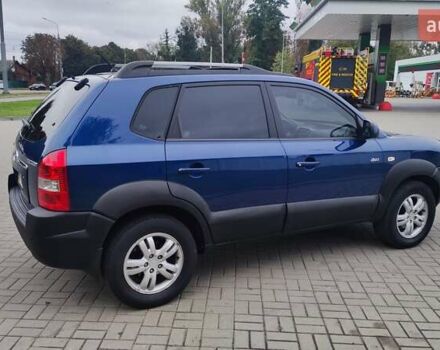 Синій Хендай Туксон, об'ємом двигуна 2 л та пробігом 225 тис. км за 7950 $, фото 4 на Automoto.ua