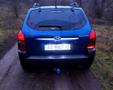 Синий Хендай Туксон, объемом двигателя 2 л и пробегом 219 тыс. км за 8400 $, фото 7 на Automoto.ua