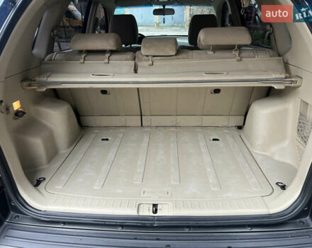 Синий Хендай Туксон, объемом двигателя 2 л и пробегом 190 тыс. км за 7500 $, фото 30 на Automoto.ua