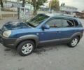 Синий Хендай Туксон, объемом двигателя 2 л и пробегом 280 тыс. км за 6500 $, фото 1 на Automoto.ua