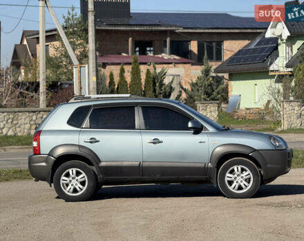 Синій Хендай Туксон, об'ємом двигуна 2 л та пробігом 317 тис. км за 6990 $, фото 3 на Automoto.ua
