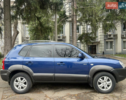 Синий Хендай Туксон, объемом двигателя 2 л и пробегом 190 тыс. км за 7500 $, фото 1 на Automoto.ua