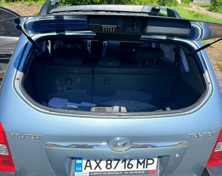Синий Хендай Туксон, объемом двигателя 2 л и пробегом 280 тыс. км за 7500 $, фото 6 на Automoto.ua