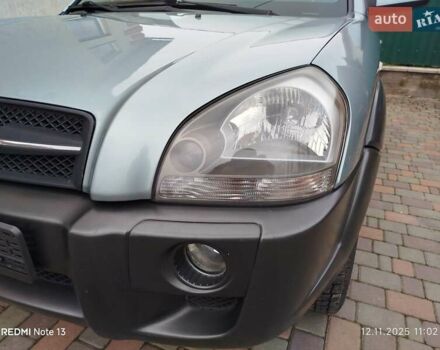 Синий Хендай Туксон, объемом двигателя 2 л и пробегом 213 тыс. км за 8900 $, фото 39 на Automoto.ua