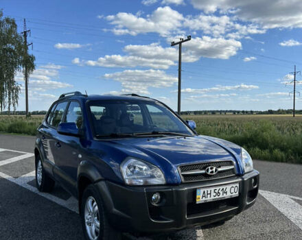Синий Хендай Туксон, объемом двигателя 2 л и пробегом 73 тыс. км за 8999 $, фото 3 на Automoto.ua