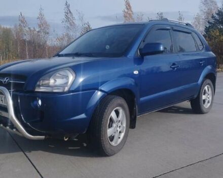 Хендай Туксон 2007 у Коростене на Automoto.ua Синій Хендай Туксон, об'ємом двигуна 1.98 л та пробігом 207 тис. км за 7000 $, фото 4 на Automoto.ua