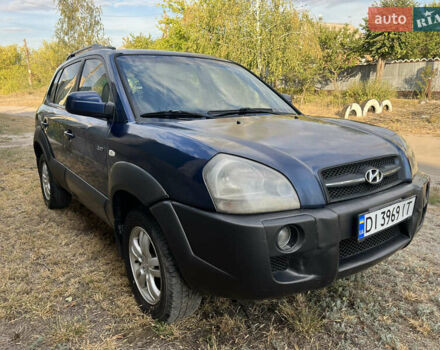 Синий Хендай Туксон, объемом двигателя 1.98 л и пробегом 210 тыс. км за 4500 $, фото 1 на Automoto.ua