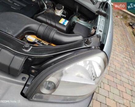 Синий Хендай Туксон, объемом двигателя 2 л и пробегом 213 тыс. км за 8900 $, фото 91 на Automoto.ua