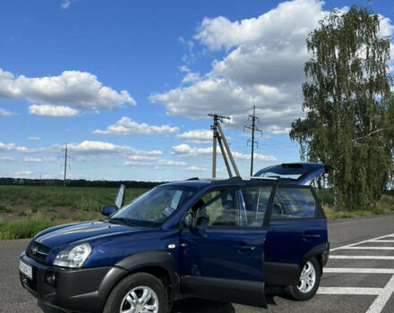 Синий Хендай Туксон, объемом двигателя 2 л и пробегом 73 тыс. км за 8999 $, фото 42 на Automoto.ua