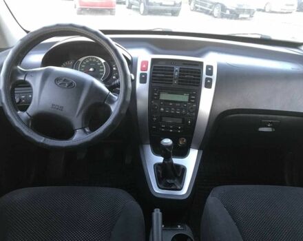 Синий Хендай Туксон, объемом двигателя 2 л и пробегом 207 тыс. км за 6890 $, фото 8 на Automoto.ua