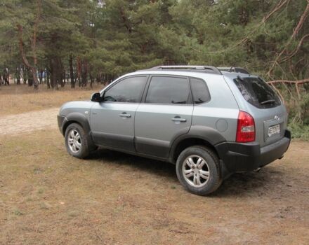 Синий Хендай Туксон, объемом двигателя 2 л и пробегом 180 тыс. км за 8000 $, фото 8 на Automoto.ua