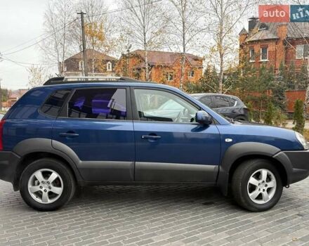 Синий Хендай Туксон, объемом двигателя 1.98 л и пробегом 163 тыс. км за 7990 $, фото 16 на Automoto.ua