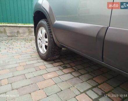 Синий Хендай Туксон, объемом двигателя 2 л и пробегом 213 тыс. км за 8900 $, фото 31 на Automoto.ua