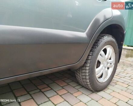 Синий Хендай Туксон, объемом двигателя 2 л и пробегом 213 тыс. км за 8900 $, фото 22 на Automoto.ua