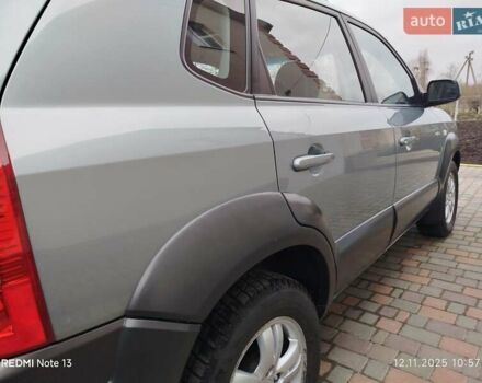 Синий Хендай Туксон, объемом двигателя 2 л и пробегом 213 тыс. км за 8900 $, фото 29 на Automoto.ua