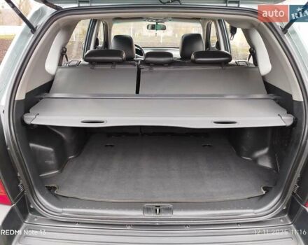 Синий Хендай Туксон, объемом двигателя 2 л и пробегом 213 тыс. км за 8900 $, фото 72 на Automoto.ua