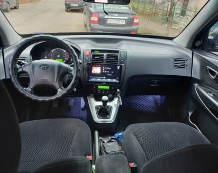 Синий Хендай Туксон, объемом двигателя 2 л и пробегом 170 тыс. км за 8500 $, фото 6 на Automoto.ua