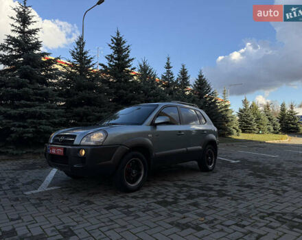 Синий Хендай Туксон, объемом двигателя 2 л и пробегом 205 тыс. км за 7500 $, фото 14 на Automoto.ua