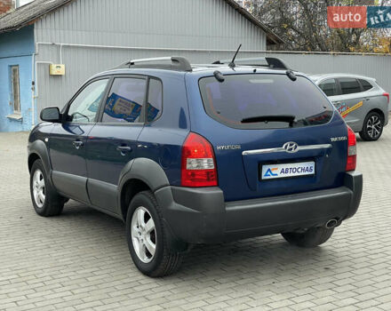 Синий Хендай Туксон, объемом двигателя 1.98 л и пробегом 163 тыс. км за 8000 $, фото 6 на Automoto.ua