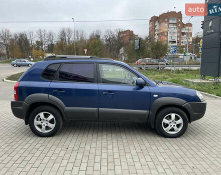 Синий Хендай Туксон, объемом двигателя 1.98 л и пробегом 163 тыс. км за 8000 $, фото 3 на Automoto.ua