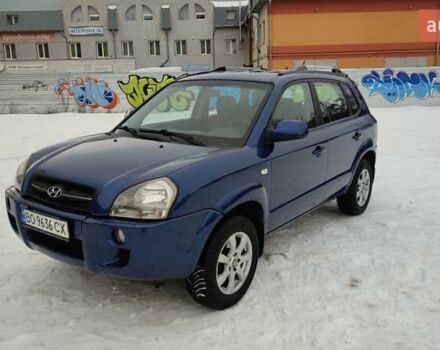 Синий Хендай Туксон, объемом двигателя 1.98 л и пробегом 228 тыс. км за 7700 $, фото 1 на Automoto.ua