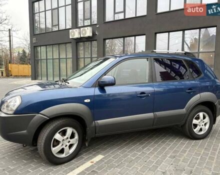 Синий Хендай Туксон, объемом двигателя 1.98 л и пробегом 163 тыс. км за 7990 $, фото 3 на Automoto.ua