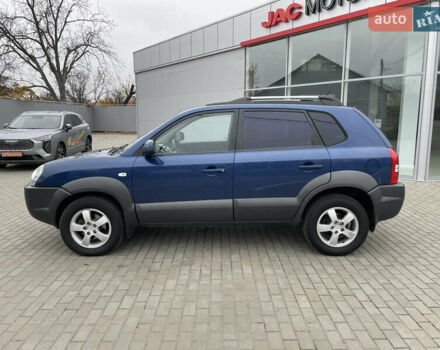 Синий Хендай Туксон, объемом двигателя 1.98 л и пробегом 163 тыс. км за 8000 $, фото 7 на Automoto.ua