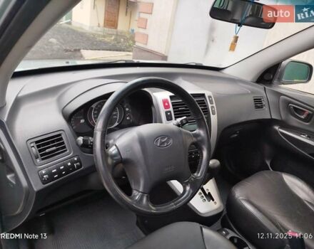 Синий Хендай Туксон, объемом двигателя 2 л и пробегом 213 тыс. км за 8900 $, фото 46 на Automoto.ua