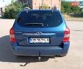 Синий Хендай Туксон, объемом двигателя 1.98 л и пробегом 250 тыс. км за 7700 $, фото 2 на Automoto.ua