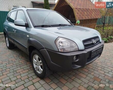 Синий Хендай Туксон, объемом двигателя 2 л и пробегом 213 тыс. км за 8900 $, фото 7 на Automoto.ua