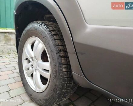 Синий Хендай Туксон, объемом двигателя 2 л и пробегом 213 тыс. км за 8900 $, фото 32 на Automoto.ua