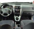 Синий Хендай Туксон, объемом двигателя 1.98 л и пробегом 228 тыс. км за 7700 $, фото 4 на Automoto.ua