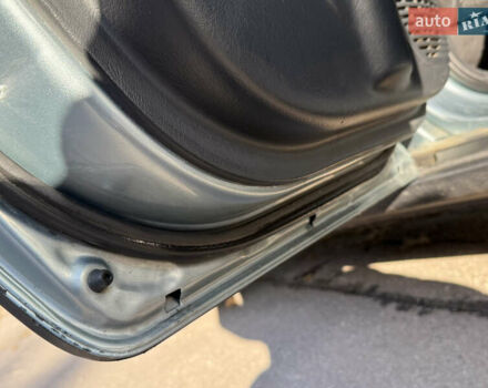Синий Хендай Туксон, объемом двигателя 2 л и пробегом 204 тыс. км за 7350 $, фото 24 на Automoto.ua