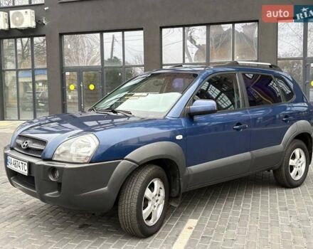 Синий Хендай Туксон, объемом двигателя 1.98 л и пробегом 163 тыс. км за 7990 $, фото 7 на Automoto.ua