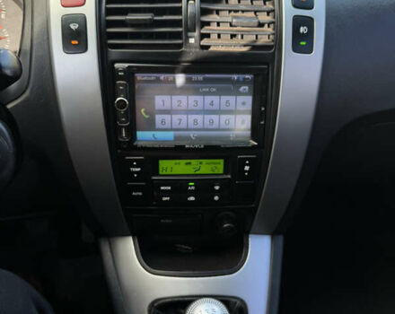 Синий Хендай Туксон, объемом двигателя 2 л и пробегом 204 тыс. км за 7350 $, фото 30 на Automoto.ua